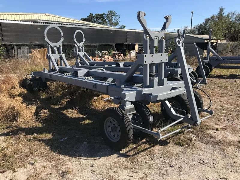 Multiple identical fabricated carts staged for a repeat-production run.